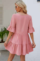 Mini-robe à manches volantées nouées